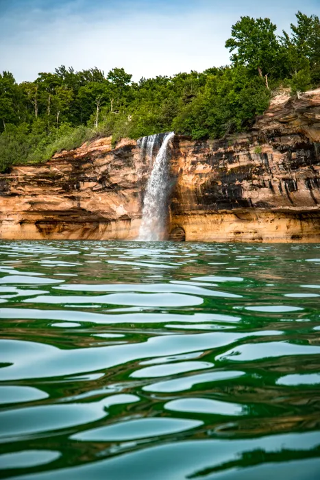 Spray Falls in the Pictured Rocks. See by boat.