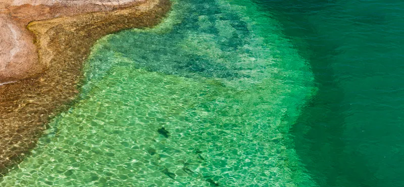 The clear, turquoise waters near Pictured Rocks National Lakeshore