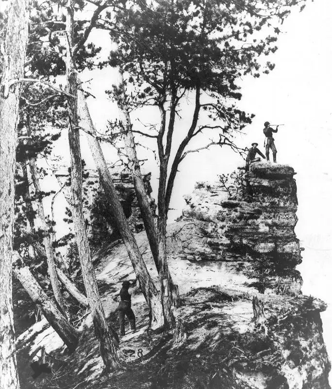A black and white photo of Miners Castle